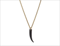 Black zircon on black rhodium