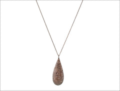 Brown zircon on black rhodium on a white gold plated chain
