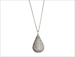 White zircon on black rhodium with a black rhodium chainTitle